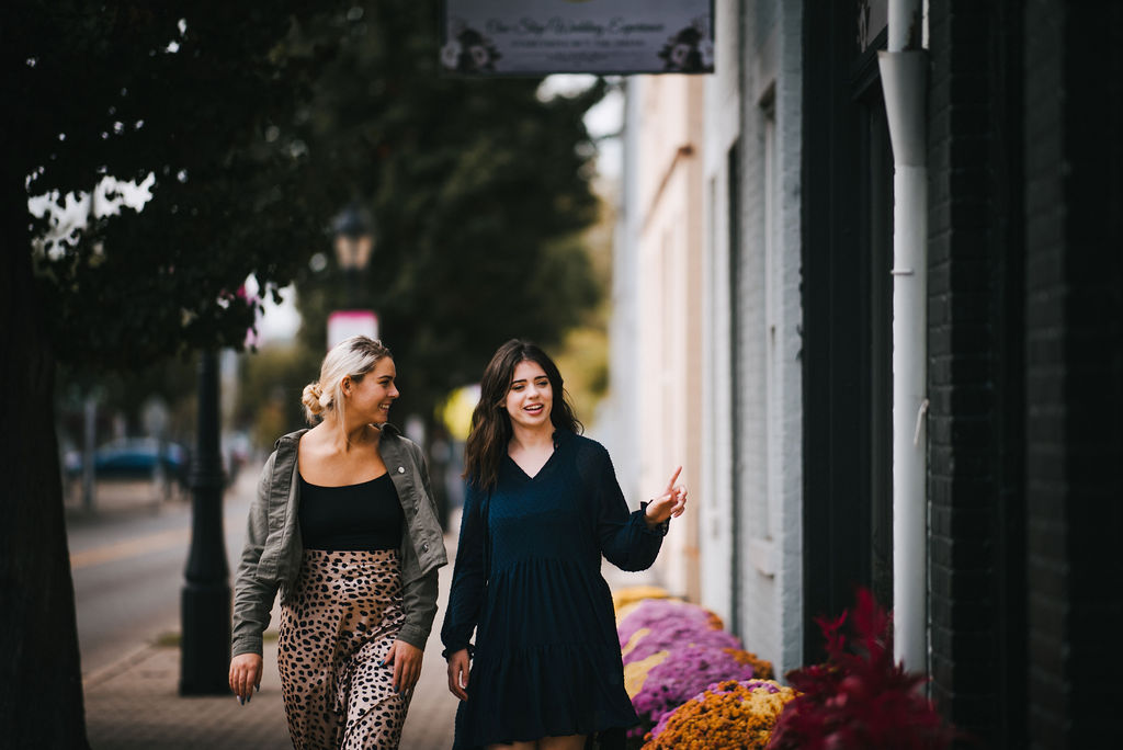 Two visitors enjoying the shops in the Reading Bridal District
